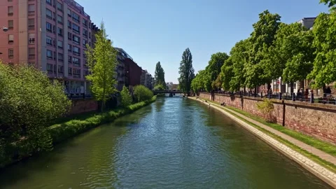 Drone flight over Canal du Faux-Rempart in Strasbourg, France. Aerial forward Stock Footage 336250268
