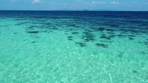 Drone Flight Over Changing Water Colors Bamboo Island Deep Blue Transition Stock Footage 331145038