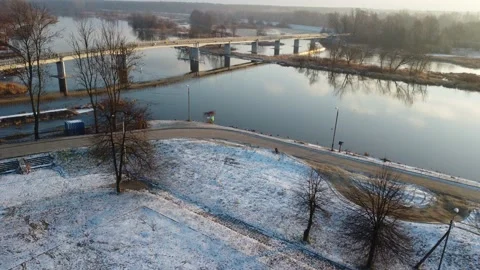 Drone flight over the city, river and bridges on a sunny winter day. Stock Footage 168516049