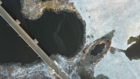 Drone flight over the city, river and bridges on a sunny winter day. Stock Footage 168519433