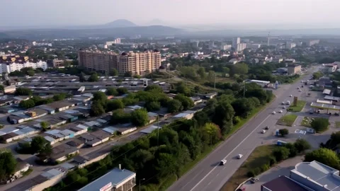 Drone flight over the city at sunset Stock Footage 158816714