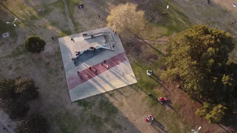 Drone flight over a class of tango couples dancing outdoors in the park of Stock Footage 211936043
