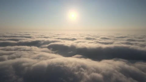 Drone flight over the clouds during sunset. Fly through the clouds. Golden hour Stock Footage 249372555