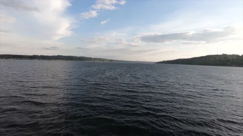 Drone flight over the coast of Seattle, Washington. Camera goes towards Stock Footage 237066532