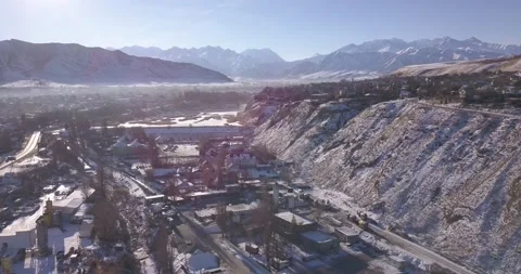 Drone flight over a cold village covered with snow in winter. DJI 0865 Stock Footage 226185751