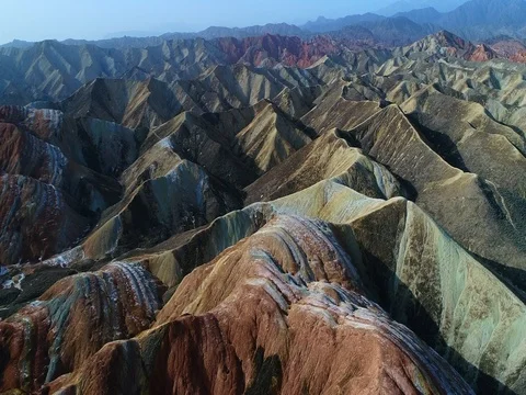 Drone flight over colorful Rainbow Mountains in Zhangye Stock Footage 77076513