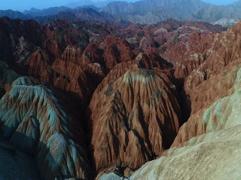 Drone flight over colorful Rainbow Mountains in Zhangye Stock Footage 77077825