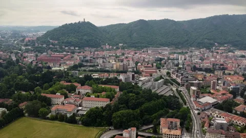 Drone flight over Como city - Baradello Tower and mountain landscape in Italy Stock-Footage 325794171