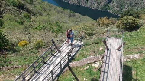 Drone flight over a couple on the Sil River viewpoint Stock Footage 123217667