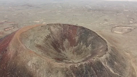 Drone flight over crater of Volcano Calderón Hondo on Fuerteventura Spain Stock Footage 201865268