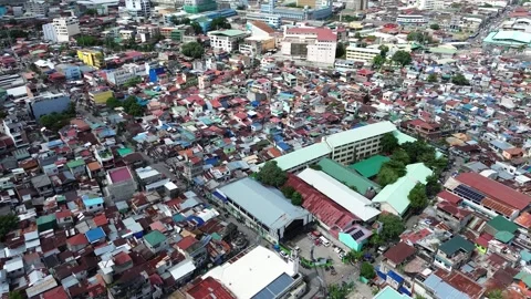 Drone flight over crowded residential neighborhood in Cebu Philippines 14 Stock-Footage 334052569