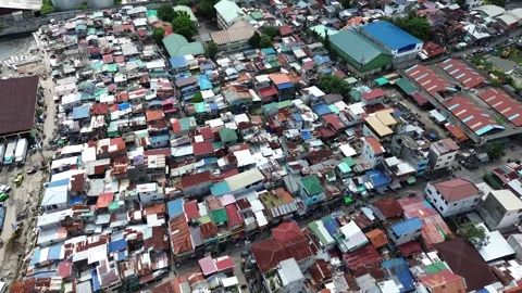 Drone flight over crowded residential neighborhood in Cebu Philippines 15 Stock Footage 334052960