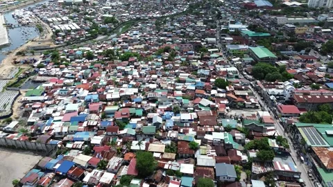 Drone flight over crowded residential neighborhood in Cebu Philippines 18 Stock-Footage 334053401