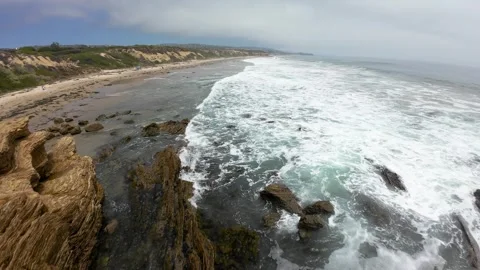 Drone flight over the Crystal Cove State Park Beach in California. Stock Footage 280691704