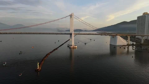 Drone flight over Da Nang and Thuan Phuoc Bridge at sunrise, Vietnam Stock Footage 340874926