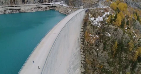 Drone flight over a dam in Emosson Video stock 102571097