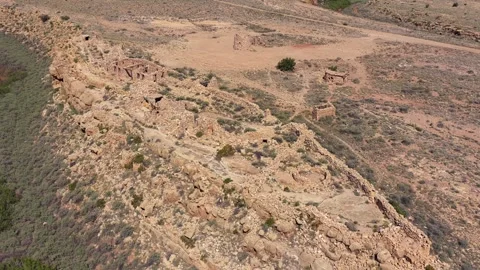 Drone Flight Over a Desolate Southwest Ghost Town Featuring Weathered Stone Video stock 333865312