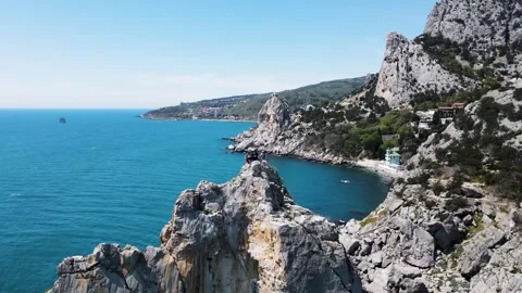 Drone flight over Diva rock, Simeiz village, Crimea. Stock Footage 256799224