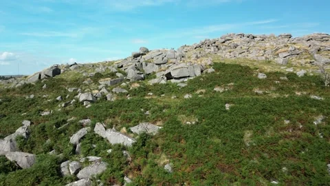 Drone flight over Down Tor in Dartmoor Nationa Park UK Stock Footage 205827013