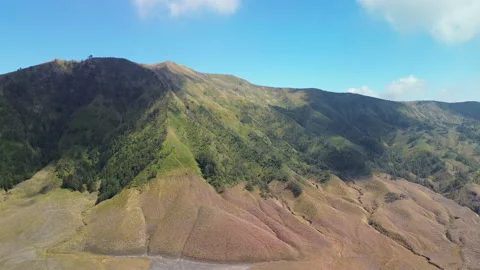 Drone Flight over Dry Teletubby Hills near Mount Bromo, Indonesia Stock Footage 343734936