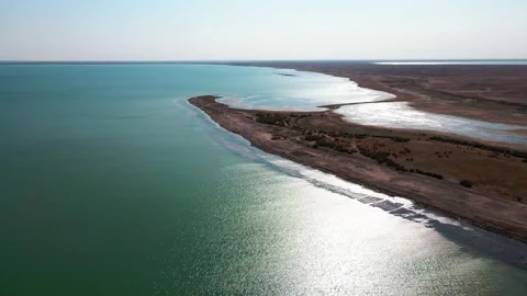 Drone flight over the dry-type playa and the lake Stock Footage 226745323