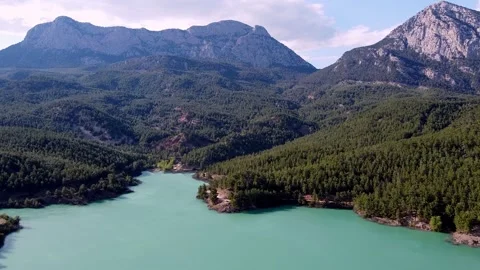 Drone flight over an emerald mountain lake Stock-Footage 153064769
