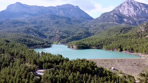 Drone flight over an emerald mountain lake Stock-Footage 153065510