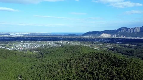 Drone flight over an emerald mountain lake Stock Footage 153066092