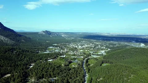 Drone flight over an emerald mountain lake Stock Footage 153066270