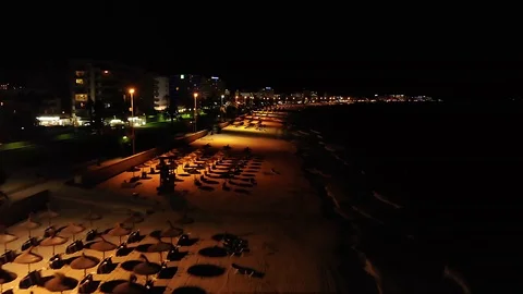Drone flight over an empty beach in Mallorca, Spain at nighttime. Stock Footage 125583734