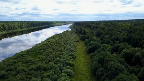 Drone flight over a field river and forest, in the country Stock-Footage 142895276