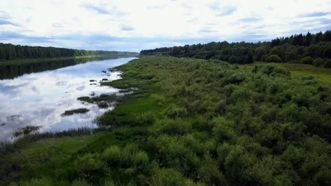 Drone flight over a field river and forest, in the country Stock Footage 142895592