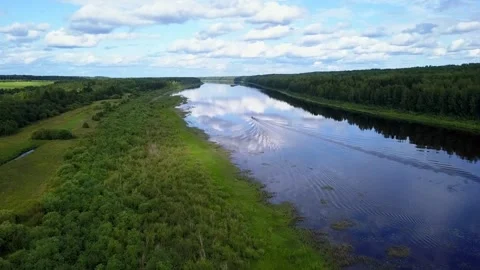 Drone flight over a field river and forest, in the country Stock Footage 142895742