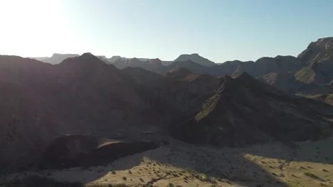 Drone Flight Over Fish River Canyon Trail and Rugged Mountains in Namibia 4K Stock Footage 337440815