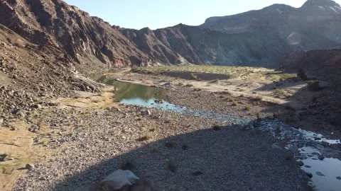 Drone Flight Over Fish River Canyon Trail and Rugged Mountains in Namibia 4K Stock Footage 337451289