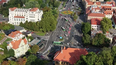 Drone Flight Over Forest Towards Livada Postei in Brasov Old Town Stock Footage 345397665