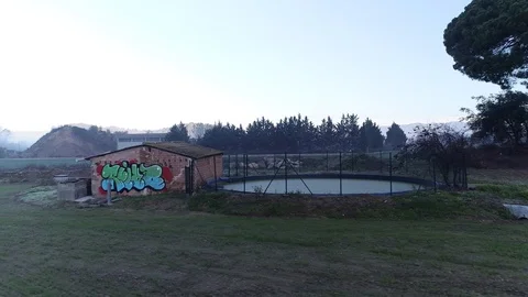 Drone flight over graffiti in an old rural cottage Video stock 99203676