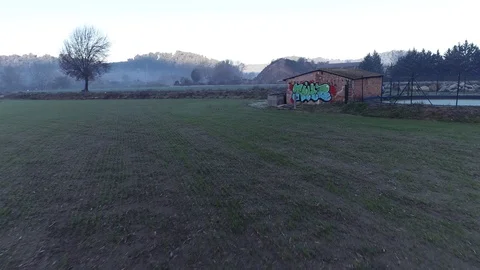 Drone flight over graffiti in an old rural cottage Video stock 99203682
