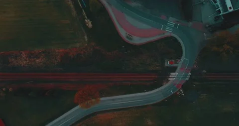 Drone flight over grass, nature at sunset. Top view of the small town, trees  Stock Footage 189858862