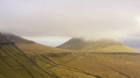 Drone Flight Over Grassy Mountain Of Funningur Video stock 134281328