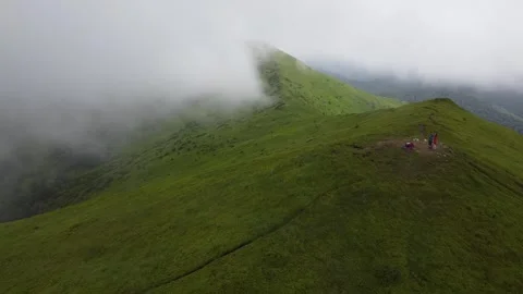 Drone flight over green Carpathian mountains in clouds, summer landscape Stock Footage 336631697