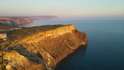 Drone flight over a high cape overlooking the sea. Stock Footage 254167814
