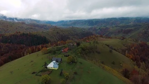 Drone flight over hills and isolated houses.Transylvania, Romania. 4k footage. Stock Footage 78022736