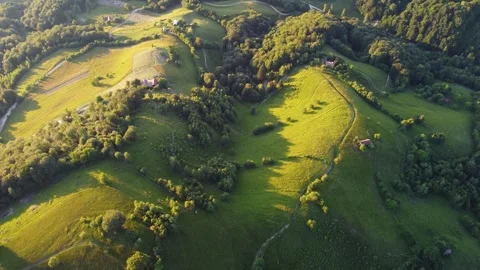 Drone flight over hills at sunset in Romania Stock Footage 311949907
