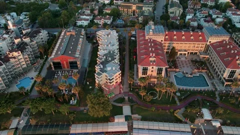 Drone flight over hotels and villa roofs in the resort town of Turkey, 4k Stock Footage 217807513