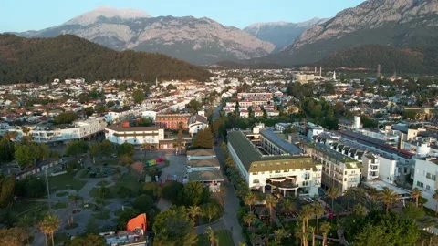 Drone flight over hotels and villas in the resort town of Turkey, 4k Stock Footage 217851361