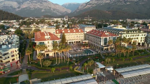 Drone flight over hotels and villas in the resort town of Turkey, 4k Stock Footage 217858818