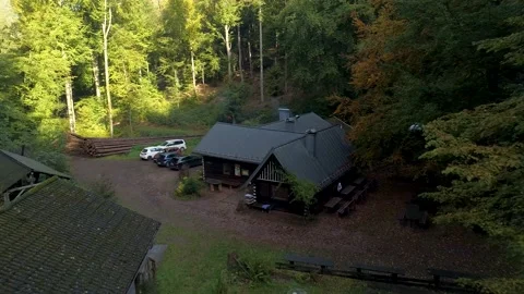 Drone Flight over Hut in the Middle of a Forest  / Camping Site  Stock Footage 131835026