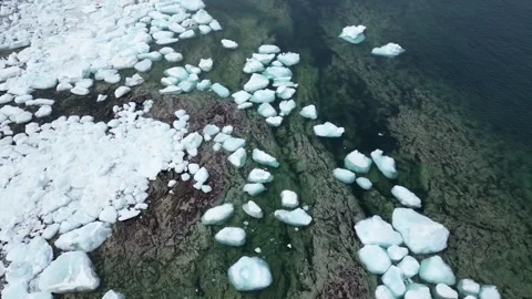 Drone Flight Over Ice Field off the Coast Stock Footage 253257595