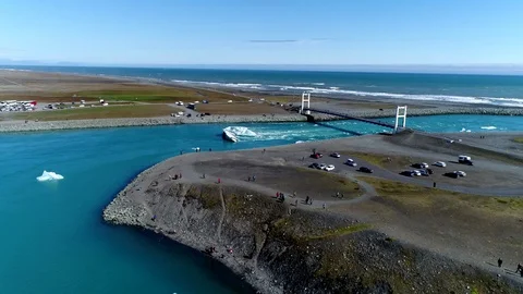Drone flight over the iceberg lagoon at Jokulsarlon in Iceland Stock Footage 94348080